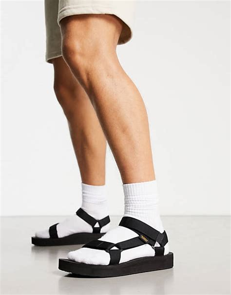 Teva Original universal midsole sandals in black | ASOS