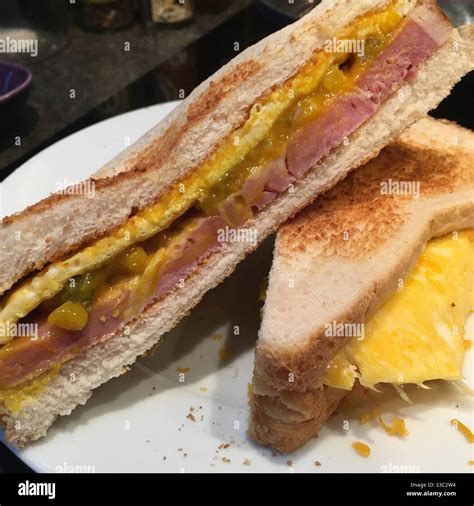 Ham and piccalilli toasted sandwich Stock Photo - Alamy