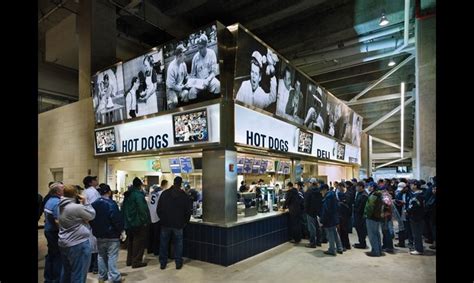 In the stadium food court, 5- by 5-ft. backlit polycarbonate panels bear high-resolution ...