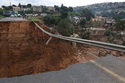 South Africa flooding: Over 300 killed after flooding washed away roads ...