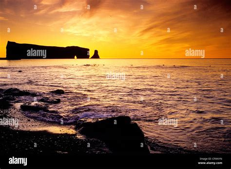 Perce Rock at sunrise, Perce, Gaspe, Quebec, Canada Stock Photo - Alamy