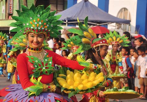 Colorful-costumes-at-the-Mango-Festival-street-dancing-competition | Curly Tales