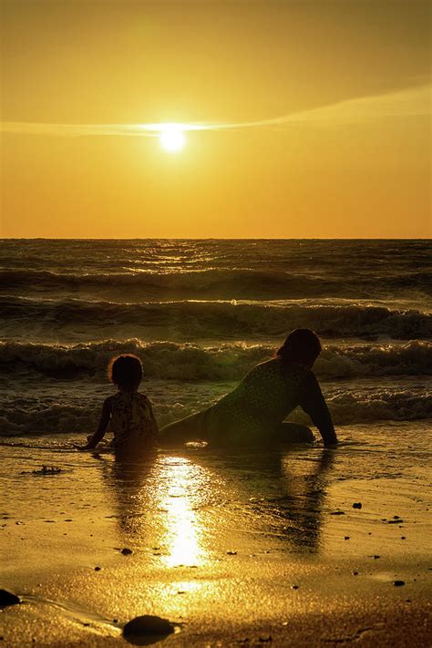 The Beach During Golden Sunset. Photograph by Ellinnur Bakarudin - Pixels