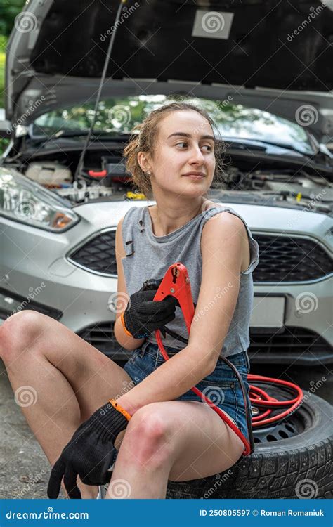 Woman Holding Jumper Cable for Recharge the Battery Car for Repairing Broken Car Stock Image ...