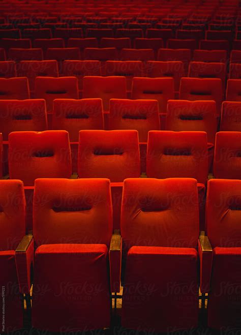 "Red Theatre Seats In Rows" by Stocksy Contributor "Pixel Stories" - Stocksy