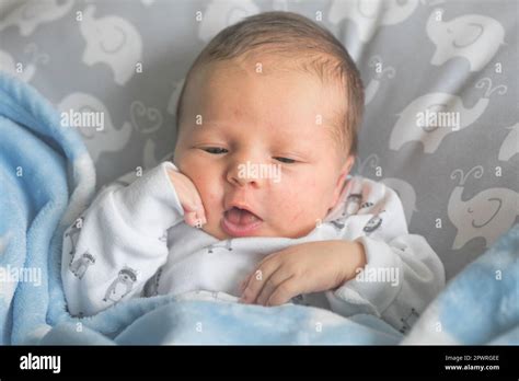 Newborn Baby Sleeping Smiling. Cute Infant Child Stock Photo - Alamy