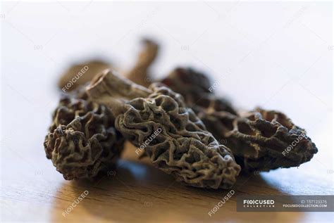 Dried morel mushrooms — unprocessed, eating - Stock Photo | #157123376