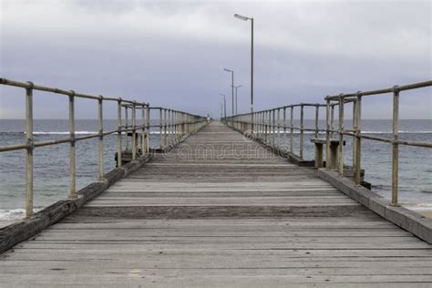 Port Noarlunga Jetty with Cloud and Sea. Stock Photo - Image of season, rust: 124522416