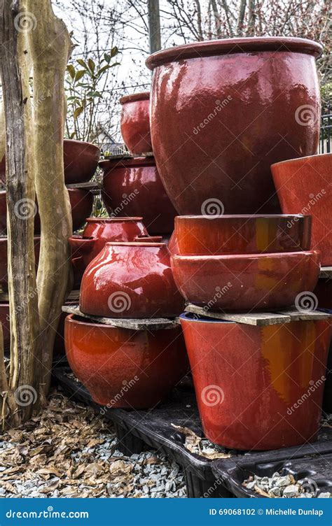 Red Ceramic Plant Pots Near Tree Stock Photos - Free & Royalty-Free Stock Photos from Dreamstime