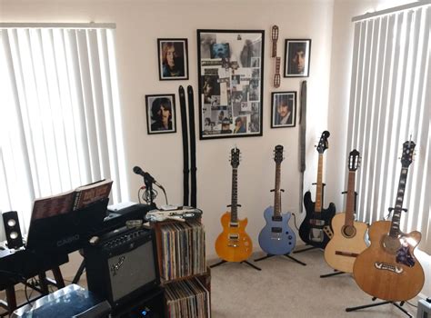 Getting the music room set up in my new place. It's a work in progress! : r/guitars