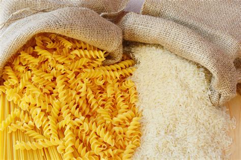 Pasta Vs Rice Stock Photo - Download Image Now - iStock