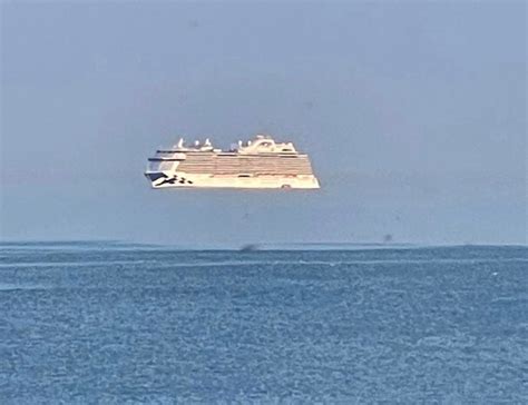 Bizarre 'floating cruise ship' spotted off British coast in mind-bending optical illusion | The ...