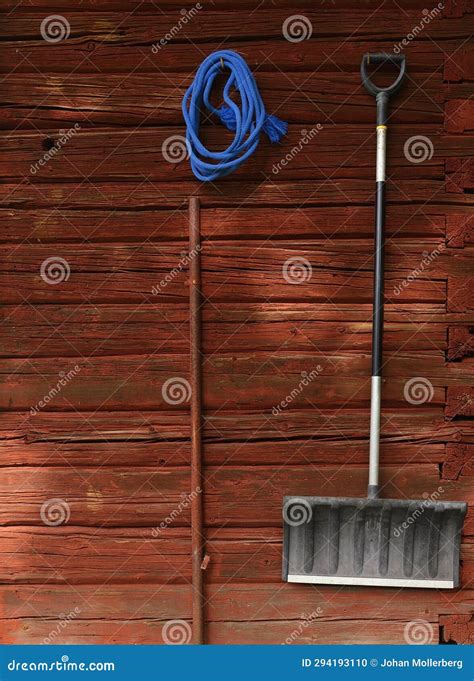 Snow Shovels Hanging Against a Red Barn Stock Photo - Image of barn ...