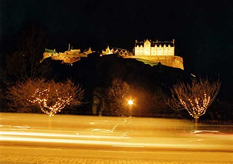 Edinburgh Castle and Christmas Lights on the trees in Princes Street Gardens