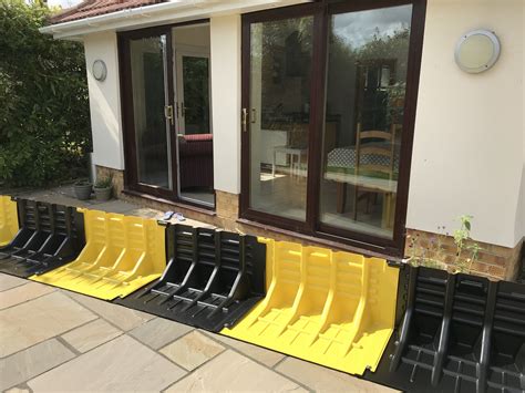 FloodFence Water Barrier Protecting Home from Flooding | Flood prevention, Flood barrier, Flood wall