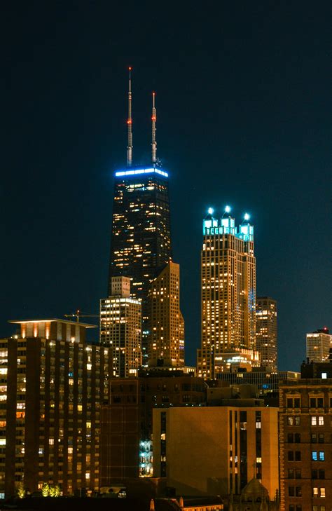 High-rise Building at Night Time · Free Stock Photo