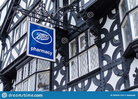 Boots Pharmacy Logo Seen in the Street in Chester Editorial Stock Photo - Image of sign ...