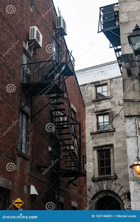 Fire Escape on a Brick Building in Urban Setting Stock Image - Image of escape, home: 162744061