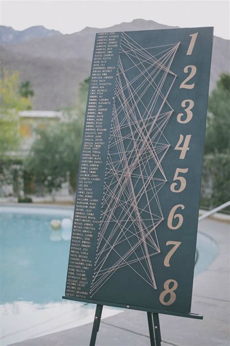 20 Unique Wedding Seating Chart Displays | Wedding table seating chart ...