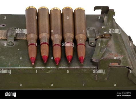 12.7mm cartridges for heavy machine gun DShK used by the former Soviet Union on green ammo box ...