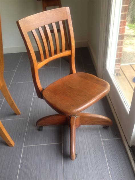 Antique wooden office swivel chair-with all wood base | InstAppraisal