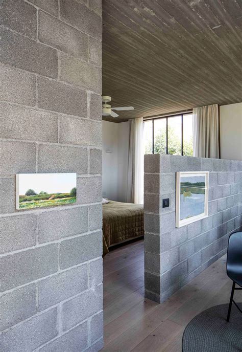 Unfinished Concrete Gives This House An Industrial Feeling | Cinder block house, Concrete houses ...