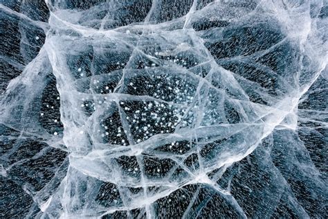 Premium Photo | Beautiful ice of lake baikal with abstract cracks