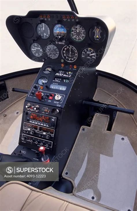 interior detail Helicopters Aviat Robinson R22 Beta II cockpit instrument panel gauges - SuperStock