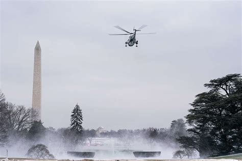 Marine One carrying President Donald J Trump First Lady Melania Trump and their son Barron Trump ...