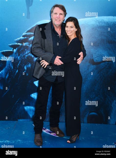 Robert Taylor and wife Ayisha Davies 091 attends the premiere of Warner Bros. Pictures and ...