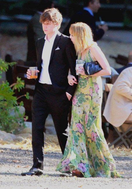 Emma Roberts at a wedding with new beau, Evan Peters for friend and stylist Emily Current in ...