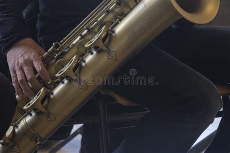 Baritone saxophone detail stock image. Image of playing - 243452581