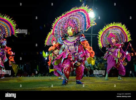Bamnia, Purulia, West Bengal , India - December 23rd 2015 : Tribal dancers performing at Chhau ...