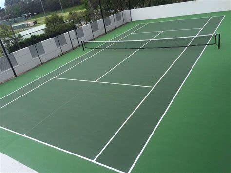 I really like the two different shade of green on this tennis court. It looks like it would be a ...