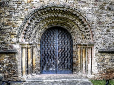 an old stone building with a wooden door