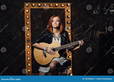 Young Girl with Red Hair with an Acoustic Guitar Stock Image - Image of ...