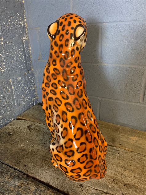 A large ceramic leopard statue made in Italy - Belle and Beast Emporium