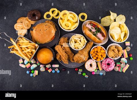 Assortment of various unhealthy junk food Stock Photo - Alamy