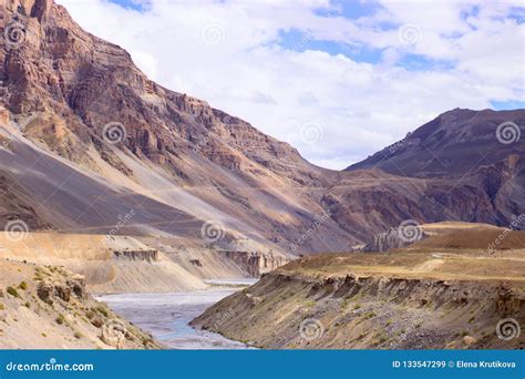 Picture of River among the Sand Dunes and Clouds. Stock Image - Image ...