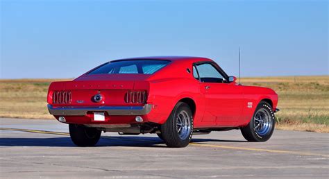 Mecum 2016 Musclecars - 1969 Ford Mustang Boss 429 Fastback in Candyapple Red » Car-Revs-Daily.com