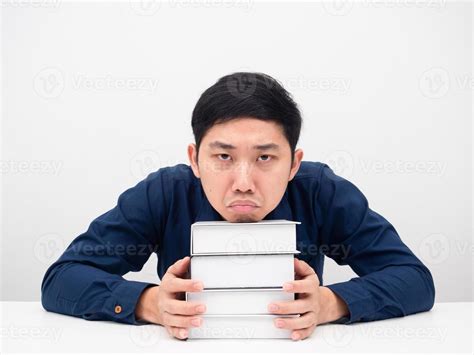 Man gesture feeling bored about reading the books on the table white background 16685643 Stock ...