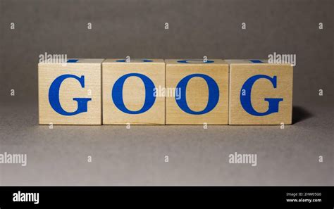 January 19, 2022. New York, USA. Exchange Ticker symbol of Alphabet Inc GOOG, made of wooden ...