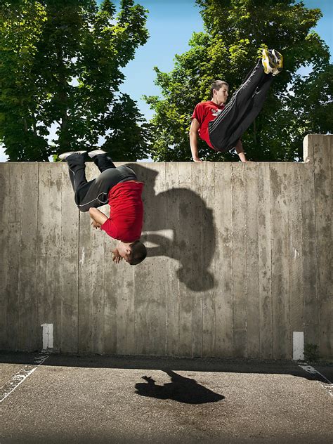 Guy jumping over fence | Communication Arts