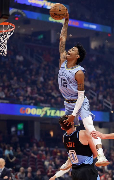 NBA: Ja Morant Dunks Over 7'1" Jakob Poeltl