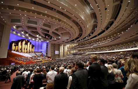 PRINT - The Mormon Tabernacle Choir and conference goers sing at the first session of the The ...