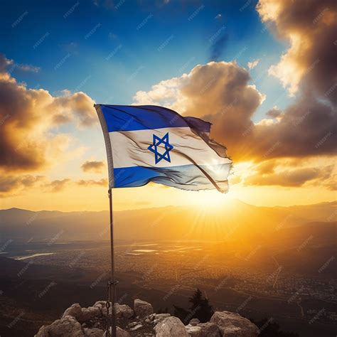 Premium AI Image | The Israeli flag on a mountain with a sunrise in the ...