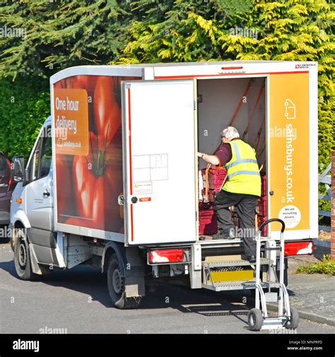 Sainsburys supermarket van driver man sorts online internet food ...