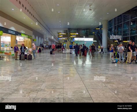 The arrivals hall at Alicante Airport at night. Alicante, Spain Stock Photo - Alamy