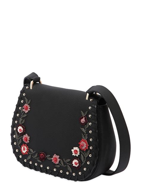 Kate Spade Tressa Floral Appliqués Leather Bag in Black - Lyst