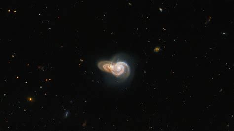 Hubble Captures Optical Illusion of Two Spiral Galaxies 'Colliding ...